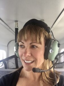 Jonni Gray in a plane